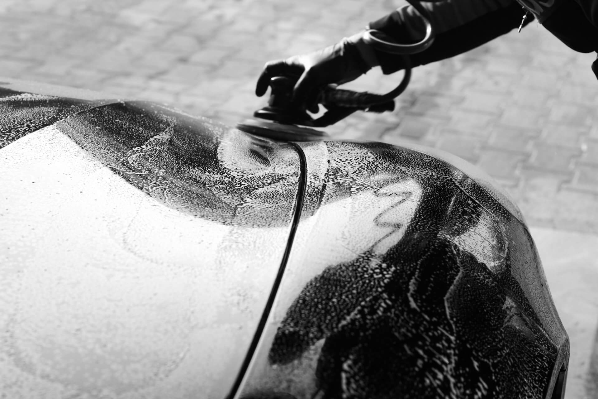 A car being waxed from the front